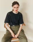 Damage tee