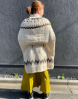 Hand knitting Nordic poncho