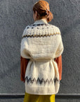 Hand knitting Nordic poncho